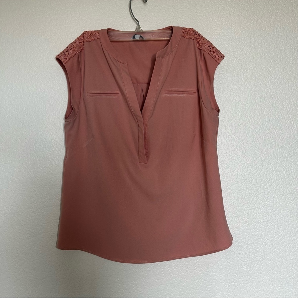 Eden Ruth Elegant Sleeveless Flowy Blouse in Dusty Pink with V-neck and Buttons